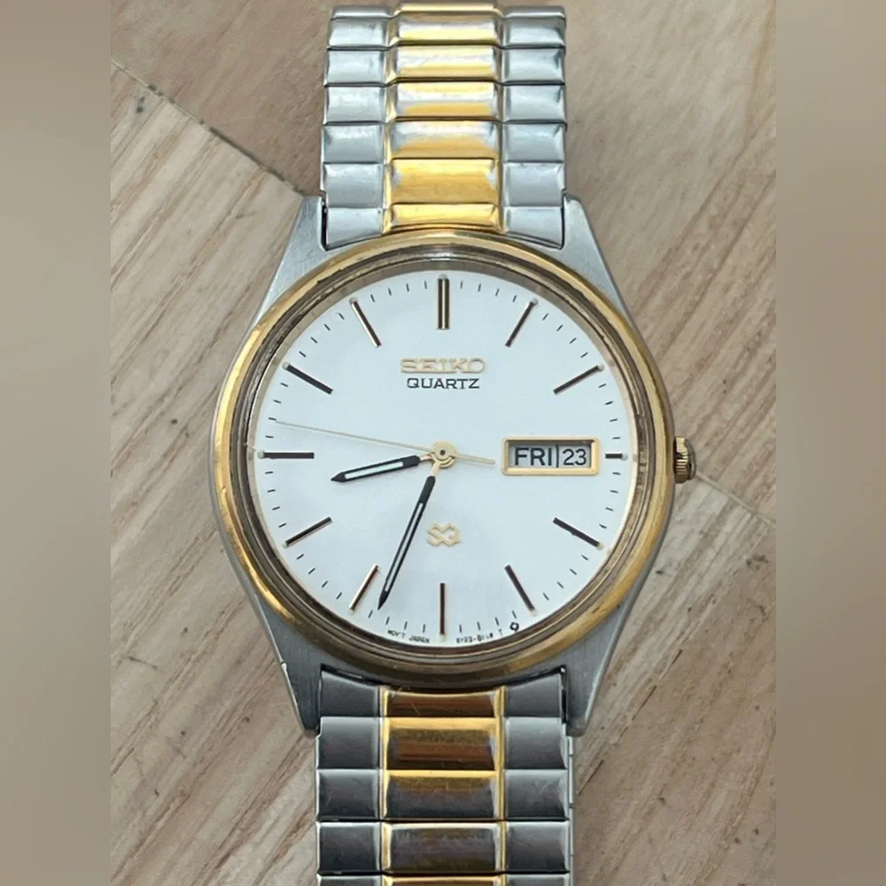 Seiko SQ Vintage Men’s Watch Two-Tone Stretch Bracelet Silver Dial Date Window